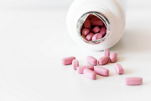 pink vitamin pills